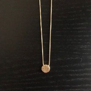Gold necklace, selling because it’s too small for me.